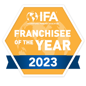 Aaron Carpenter and Joanne Oh of Grand Welcome Bend and Central Oregon Awarded Franchisee of the Year by International Franchise Association