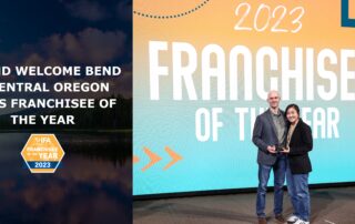 Aaron Carpenter and Joanne Oh of Grand Welcome Bend and Central Oregon Awarded Franchisee of the Year by International Franchise Association